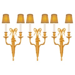 A  French 19th century Louis XVI st. Ormolu sconces