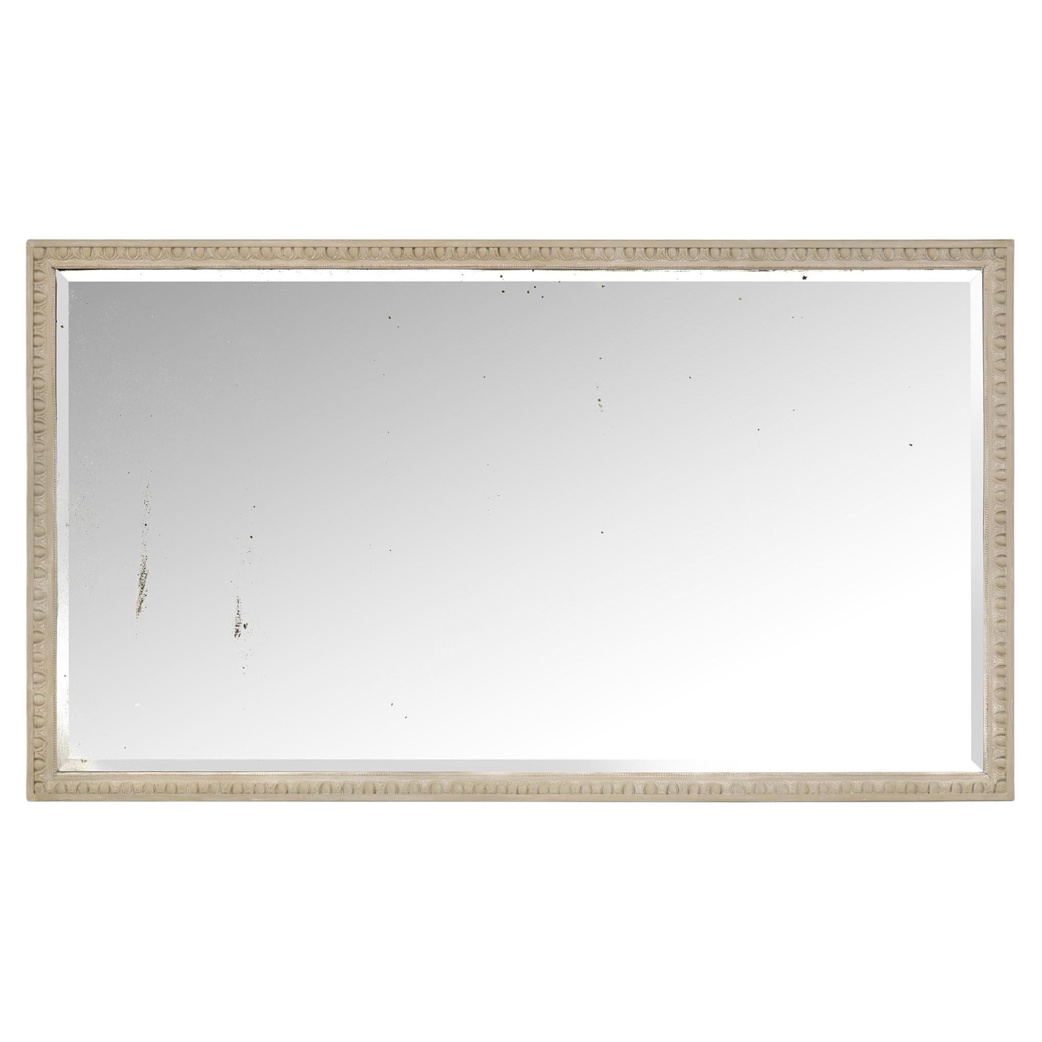 A French 19th century Louis XVI st. patinated Wood mirror For Sale