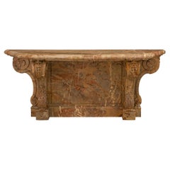 A French 19th century Louis XVI st. Sarrancolin marble console