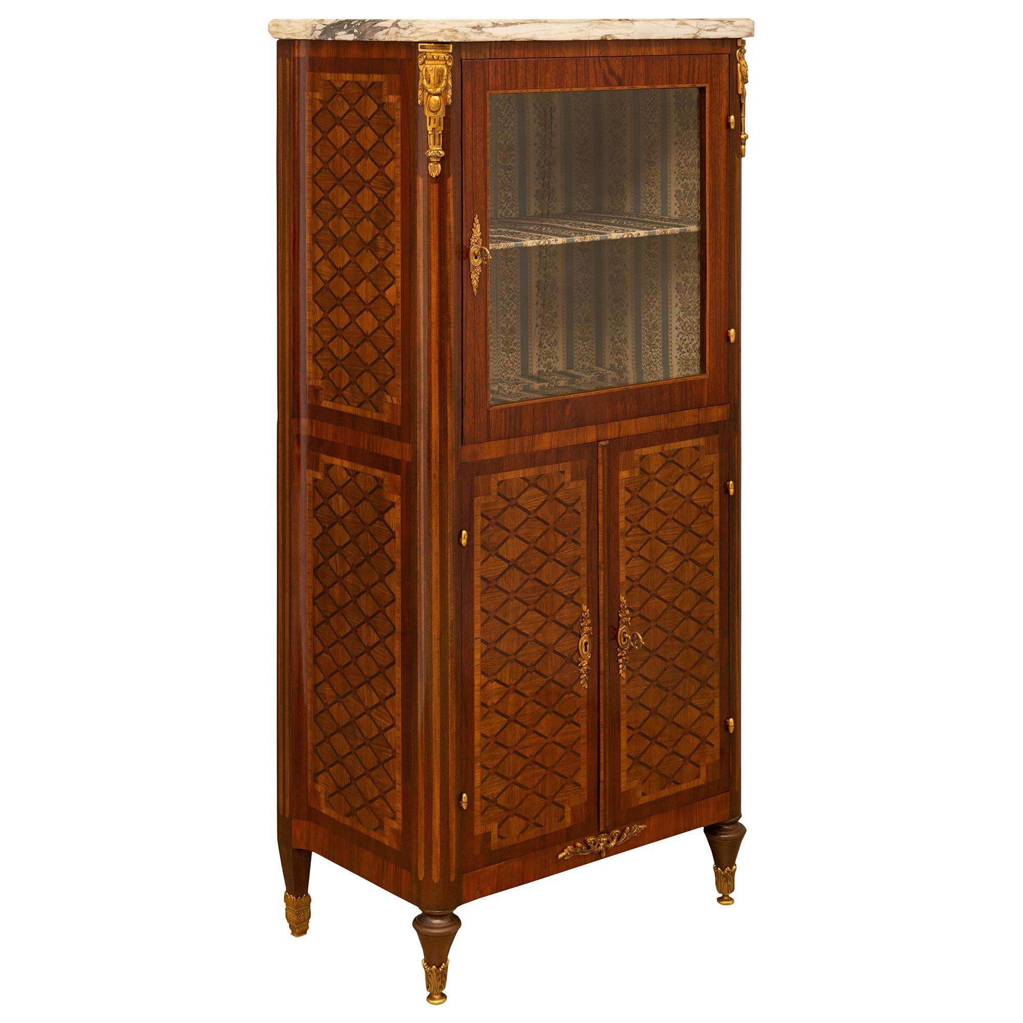 A French 19th Century Louis XVI st. Tulipwood, Kingwood and marble cabinet For Sale 1