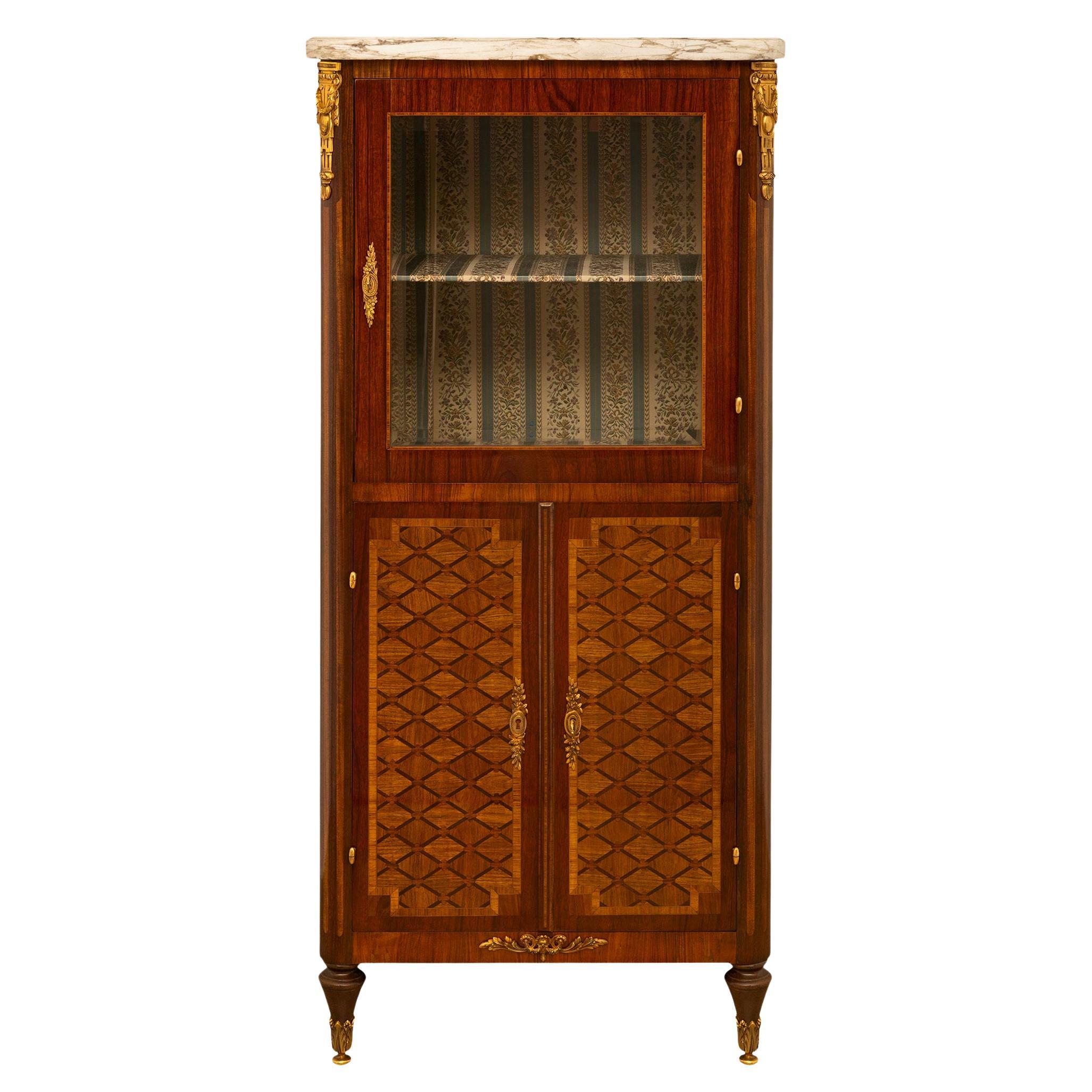 A French 19th Century Louis XVI st. Tulipwood, Kingwood and marble cabinet For Sale