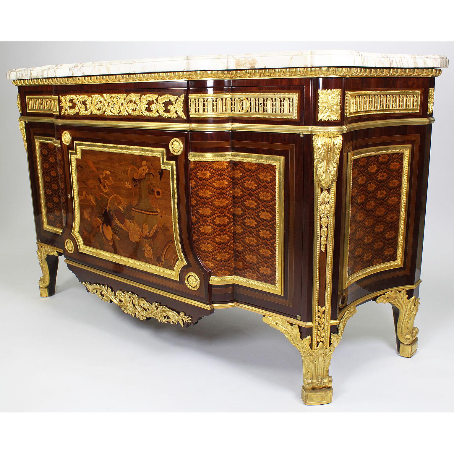 A fine French 19th century Louis XVI style ormolu-mounted mahogany, fruitwood and sycamore marquetry and parquetry commode with a Brèche Violette marble-top, after the model by Jean-Henri Riesener (1734-1806), one lock has been removed to reveal the