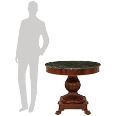 A French 19th century Mahogany and Vert de Patricia marble center table