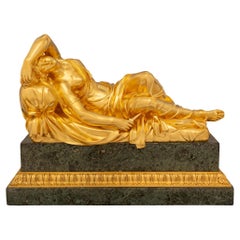 A French 19th century Ormolu and Pietra Braschia marble sculpture of Lucretia
