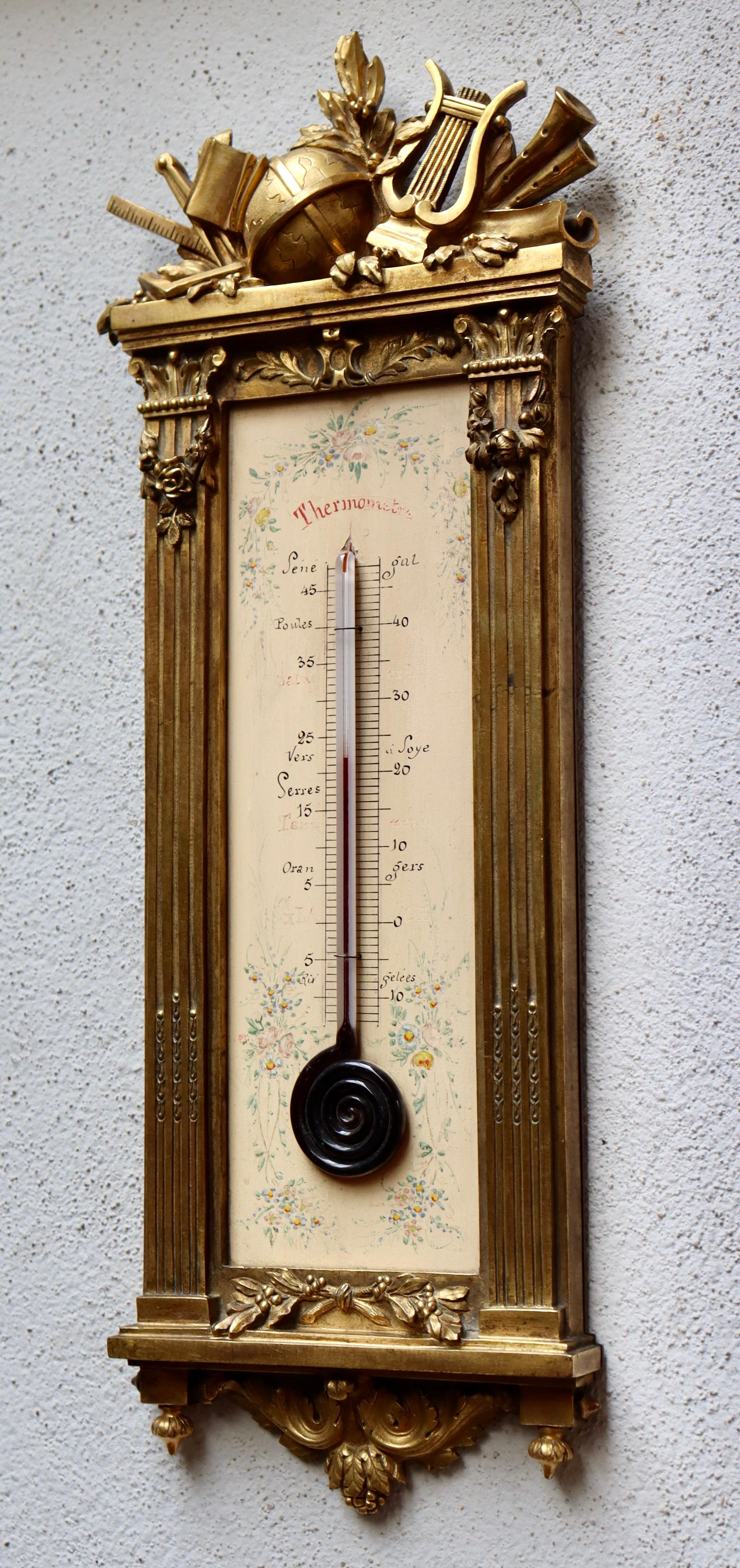 A French 19th century ormolu thermometer 
The rectangular shape very finely chiselled and designed with Science et Arts Attributes on the top and, asparagus in grooves on the sides, and acanthus leaves on the lower part.
The thermometer system, in