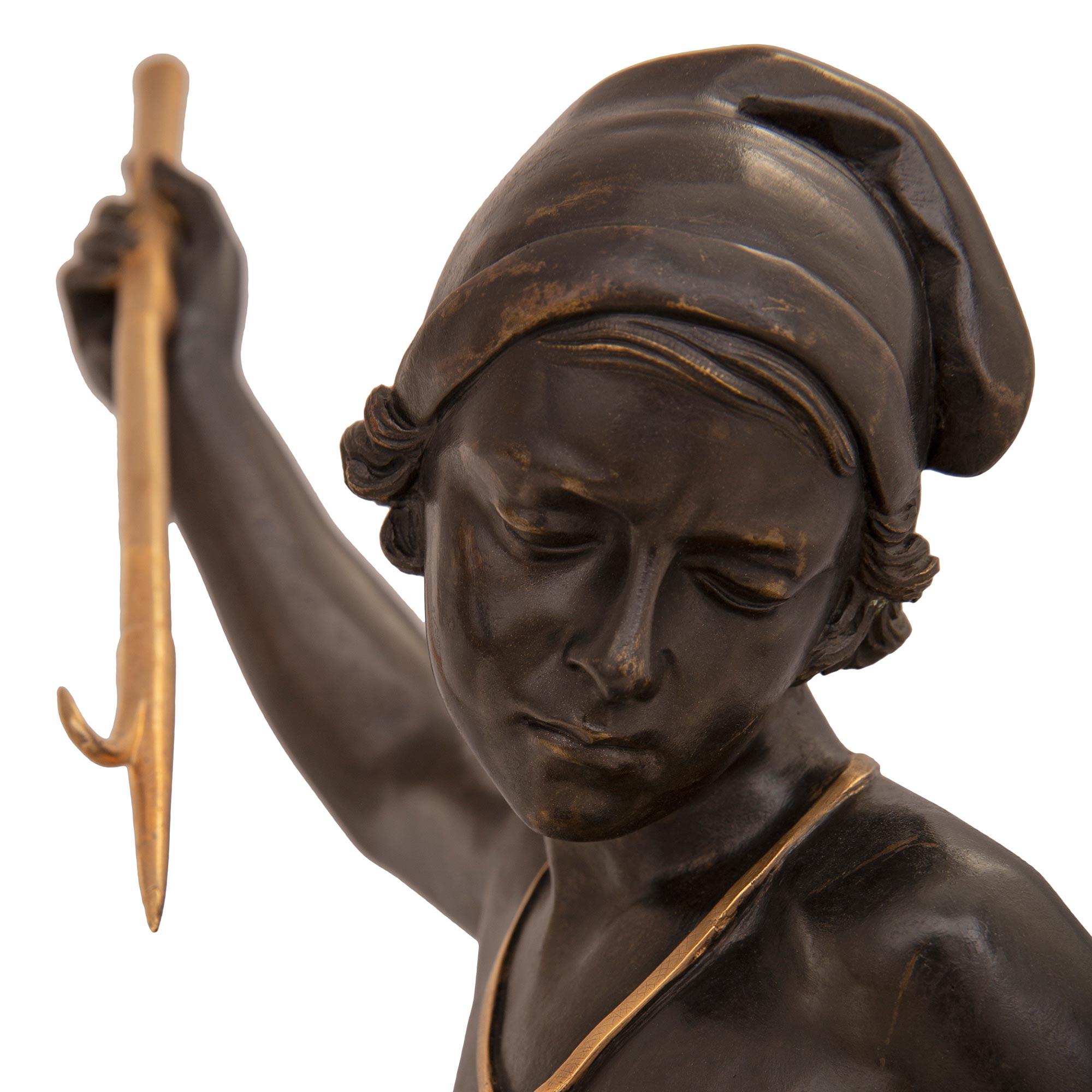 Statue française du 19ème siècle en bronze patiné et bronze doré, estampillée Tiffany Bon état - En vente à West Palm Beach, FL