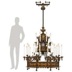 A French 19th century Renaissance st. Wrought Iron and Gilt Iron chandelier