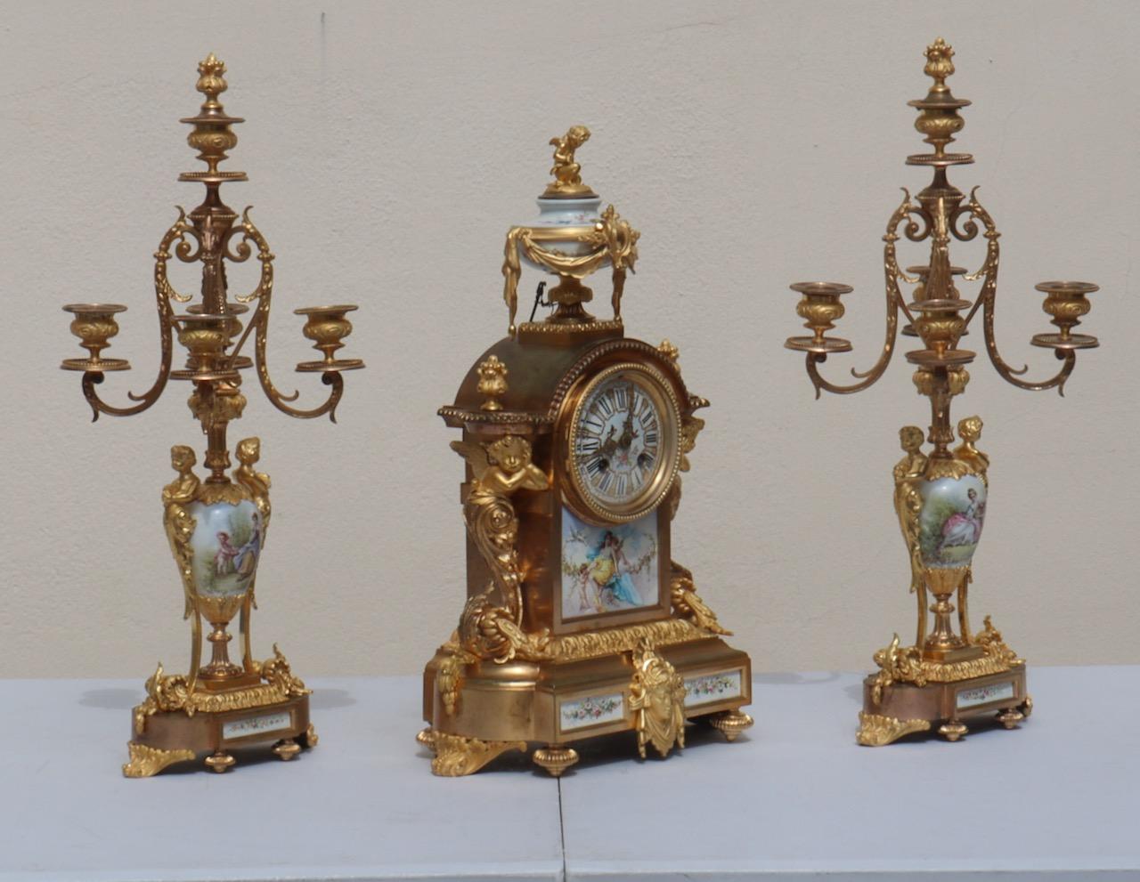 Louis XVI French 19th Century Three-Piece Sèvres Porcelain Garniture Clock For Sale