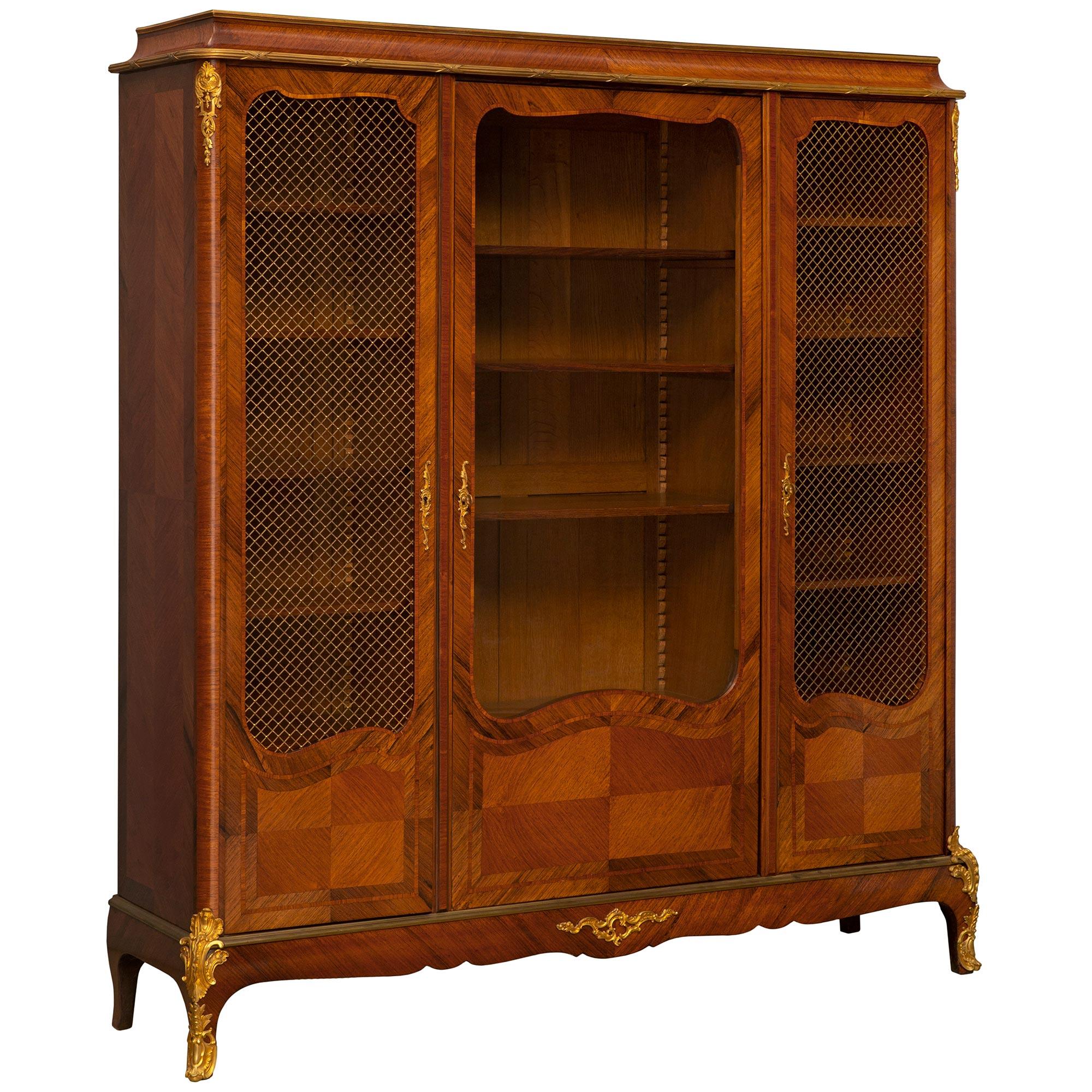 A French 19th century Transitional st. Tulipwood and Ormolu cabinet  In Good Condition For Sale In West Palm Beach, FL