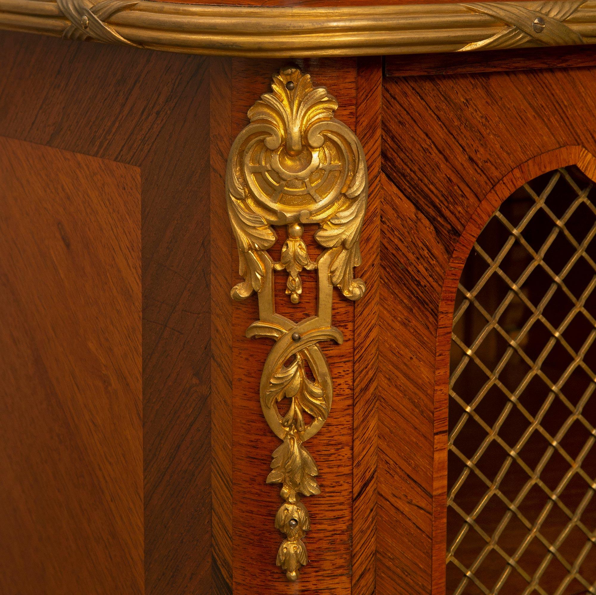 A French 19th century Transitional st. Tulipwood and Ormolu cabinet  For Sale 1