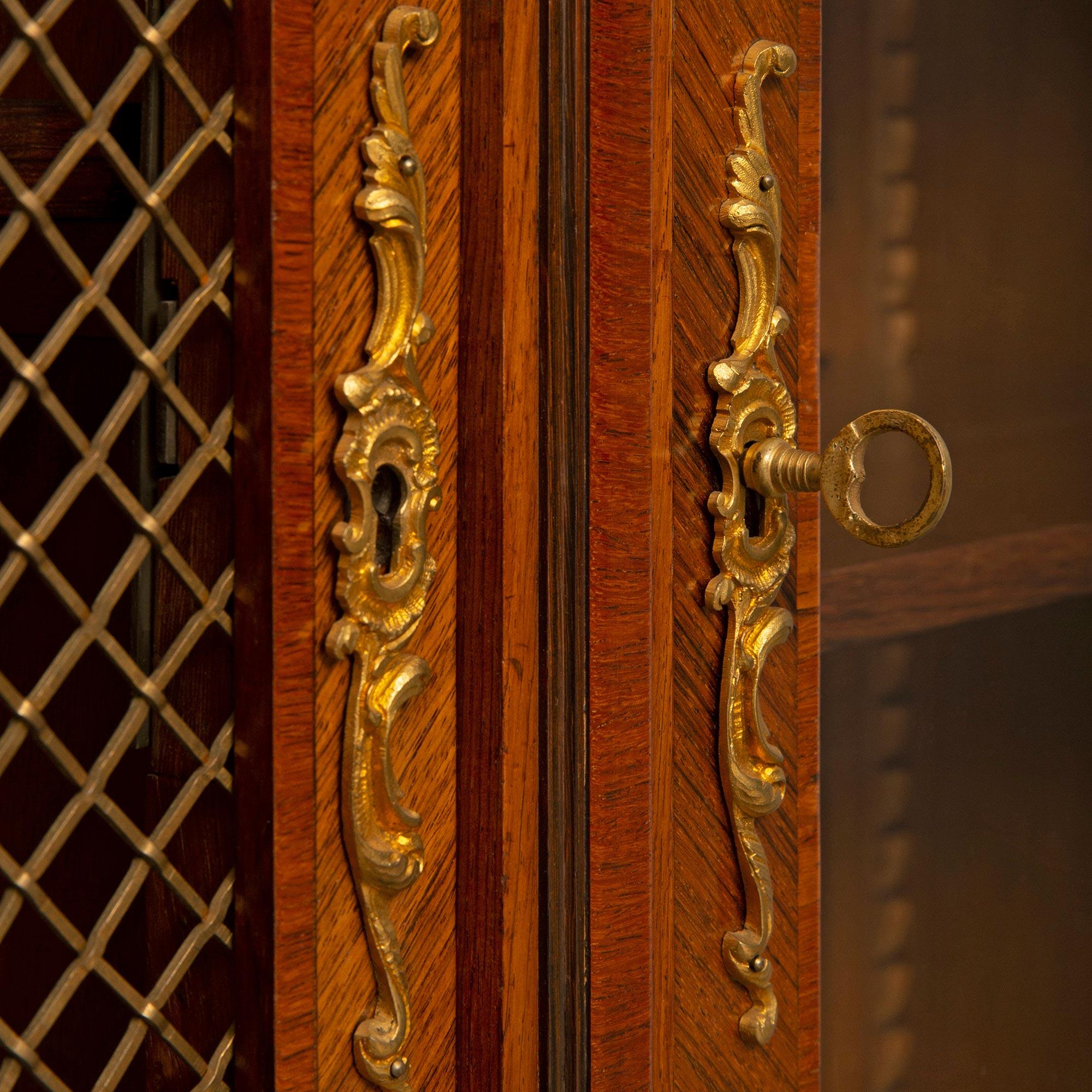 A French 19th century Transitional st. Tulipwood and Ormolu cabinet  For Sale 2