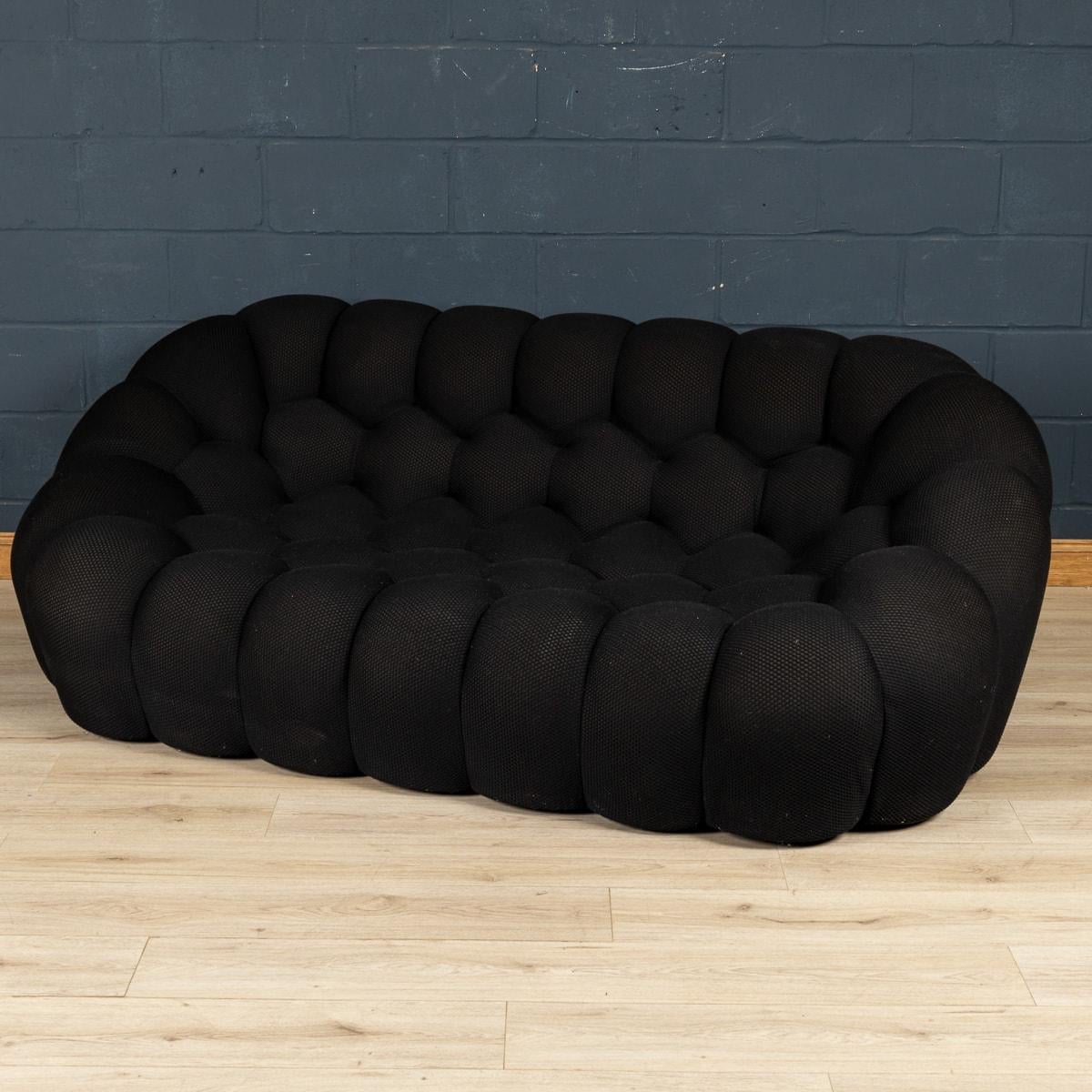 A beautiful black “Bubble“ sofa by Roche Bobois. Created by Sacha Lakic, a designer with a passion for cutting-edge technology, Bubble expresses the balance between innovation, function and emotion. Inspired by natural and mineral forms and entirely