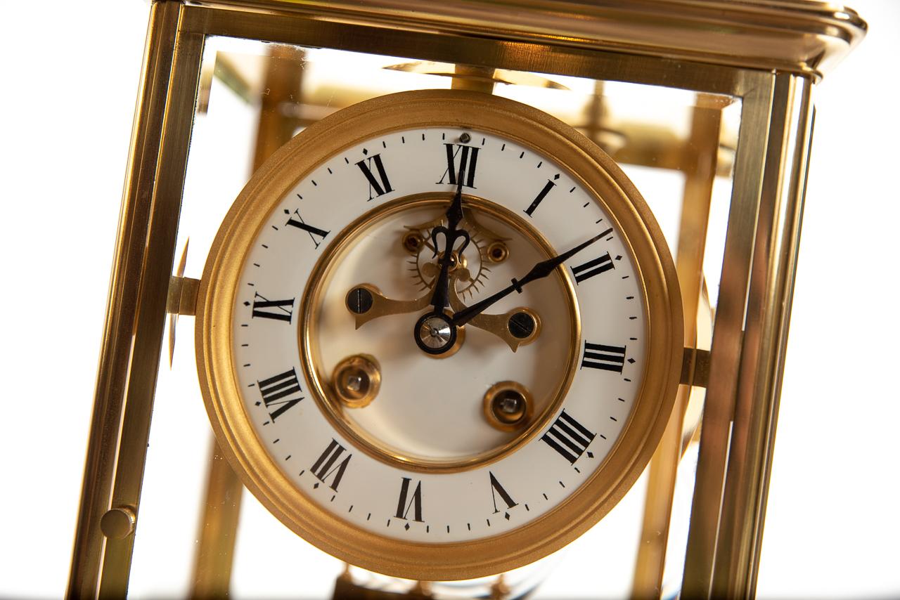 A late Victorian French four glass and brass mantel clock with open jewelled escapement. The 8 day striking 'A1' movement with numbered 57. The ornate hands and mercury pendulum by Japy Freres of Paris, France, circa 1885-1890.
A very fine example