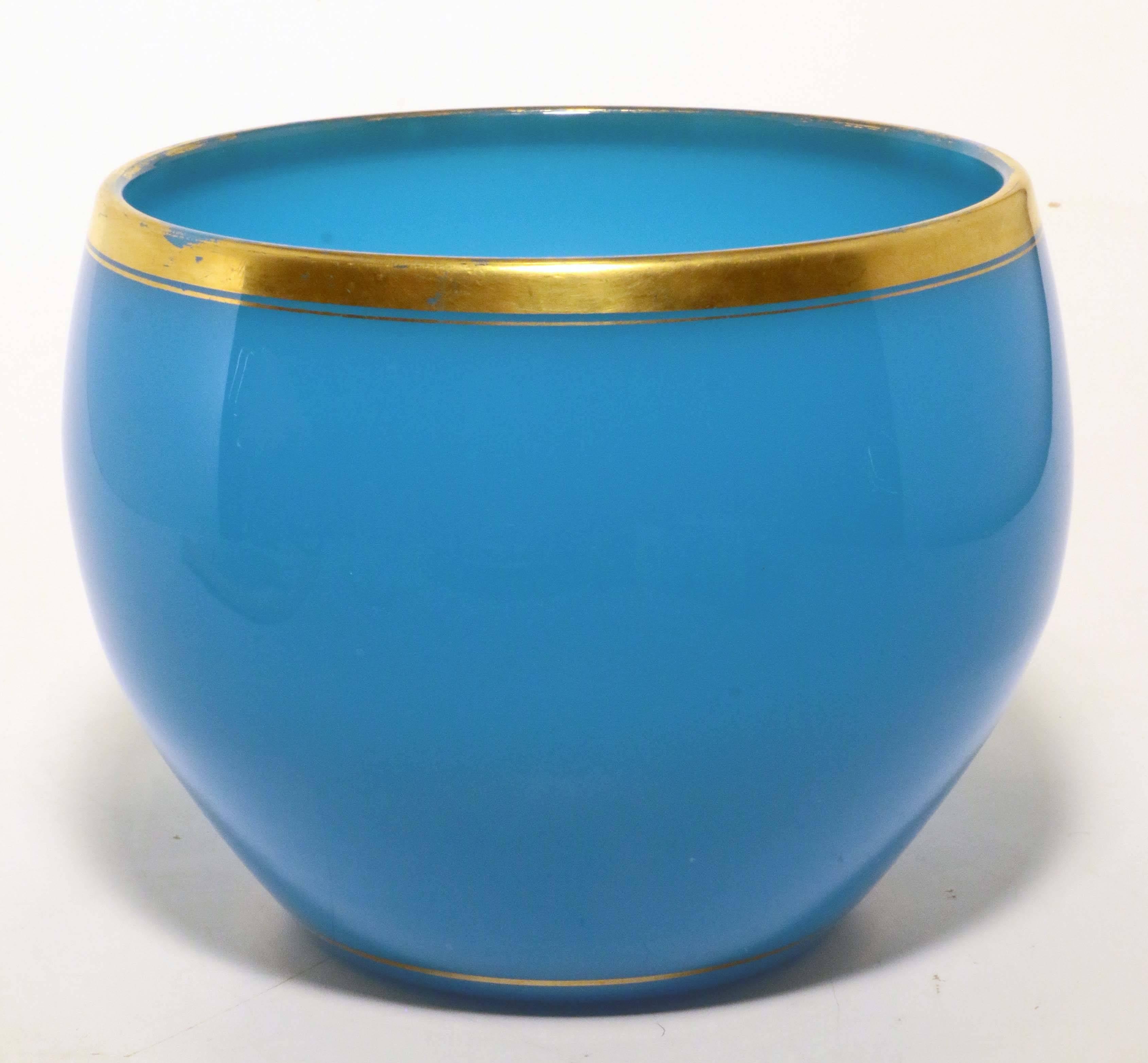 This is a very rare form from the top glass factory. French opaline glass reigned supreme in the mid-19th century. The blue color, large size and original gilding all combine to make this a piece of extraordinary interest to a collector or decorator
