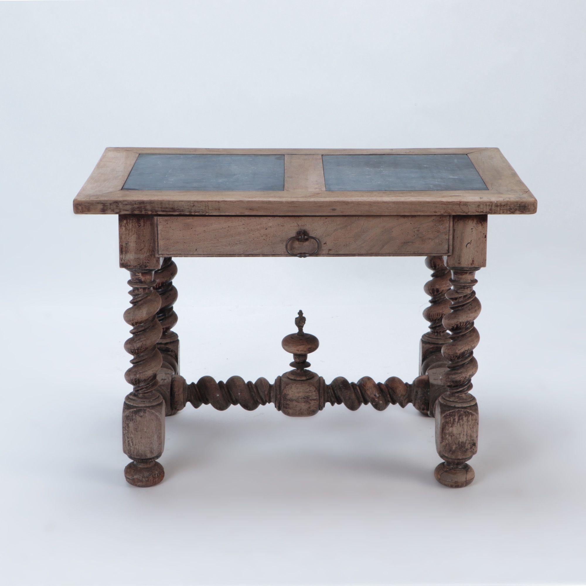 A French Antique stone top walnut table with twisted legs, circa 1880.