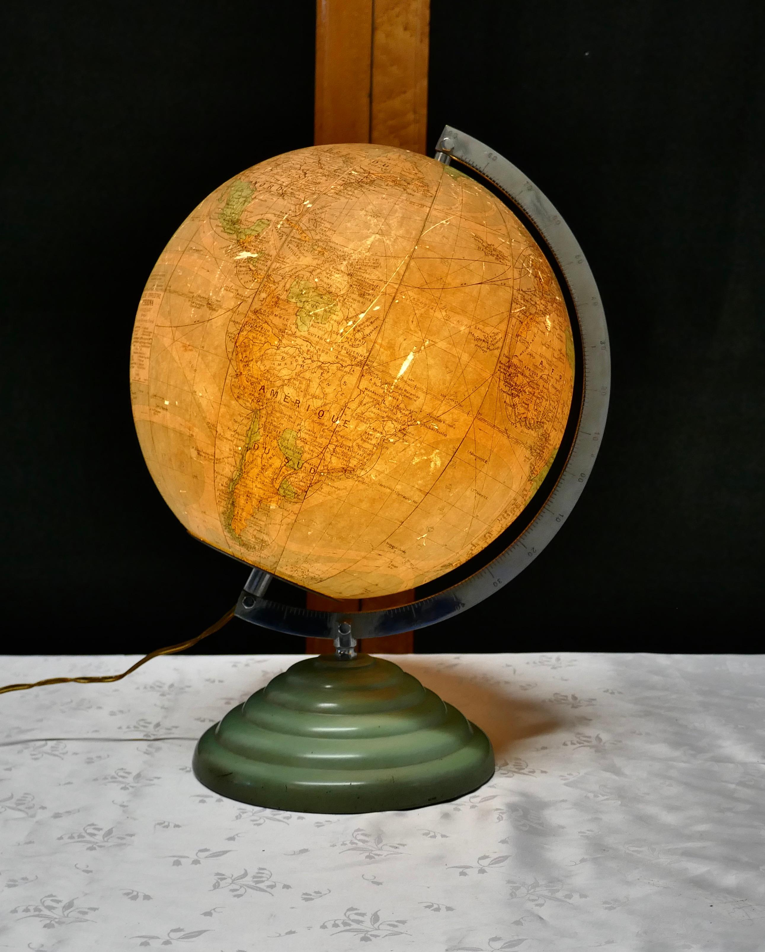 A French Art Deco 10” world globe light

The globe is in fair condition with a little surface scratching, it has a stepped painted metal base and stands 16” high, the diameter of the globe it self is 10”

ND45.