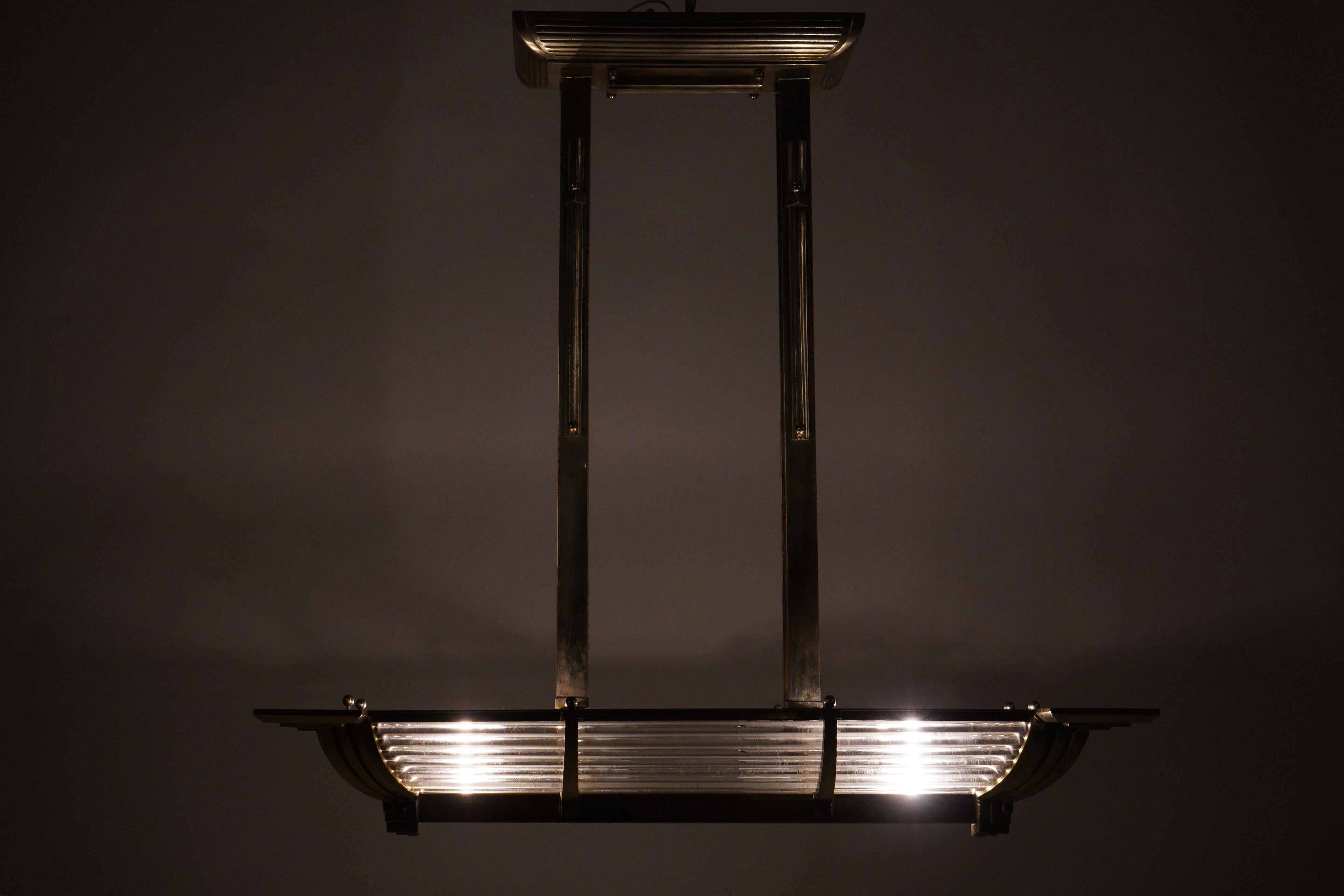 A French Art Deco “Billiard” Style Nickel Chandelier With Curved Sides In Good Condition In Chicago, IL
