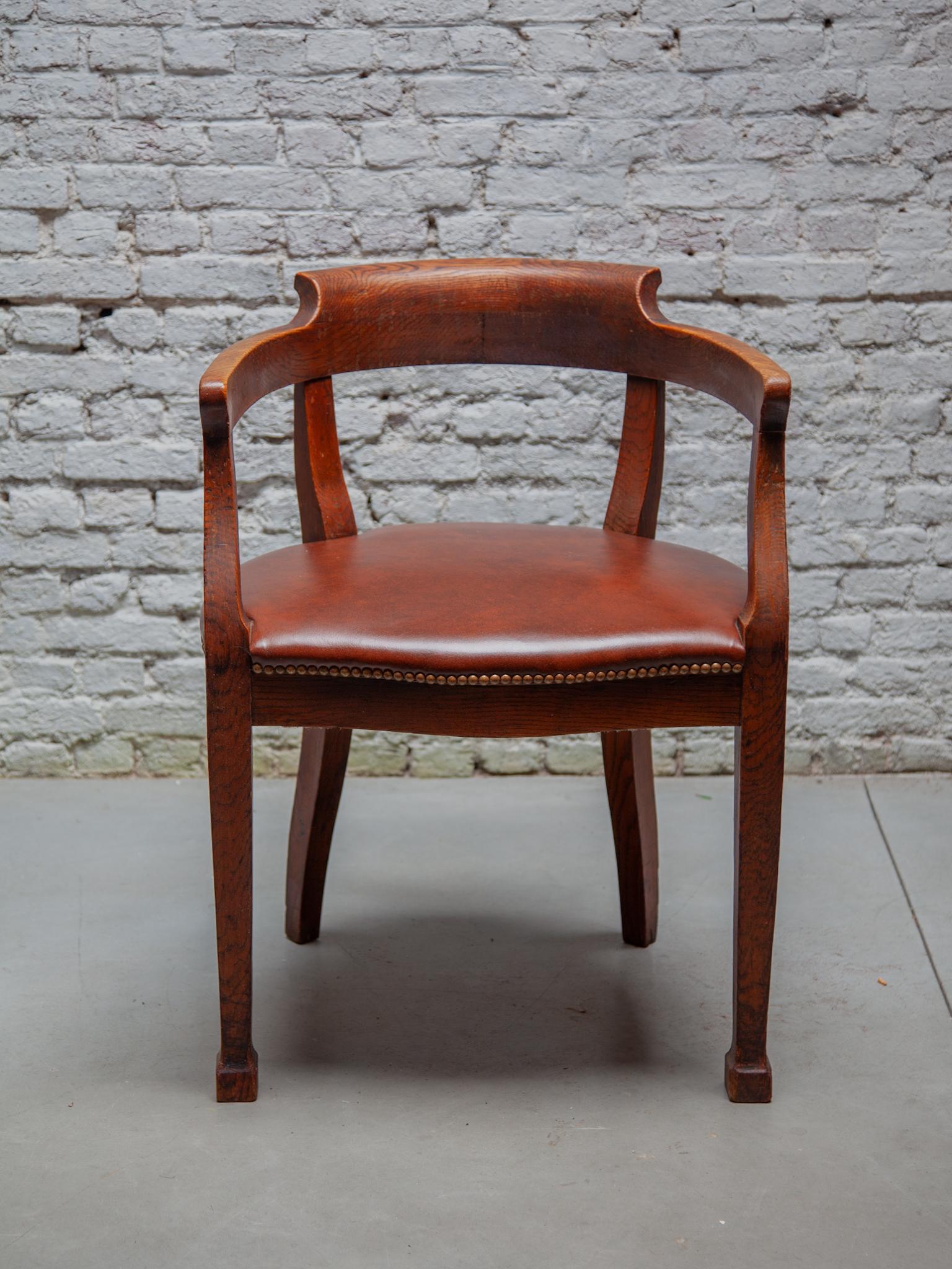 French Art Deco oak desk or side chair. Handsome French Art Deco oak desk chair. This stunning desk chair or office chair has a distressed leather seat and would look great with a French Art Deco desk in your office or interior.