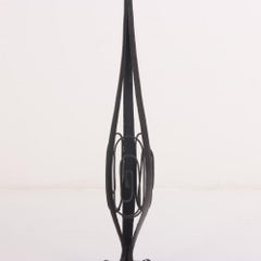 A French Art Deco hand hammered iron floor lamp C 1930
