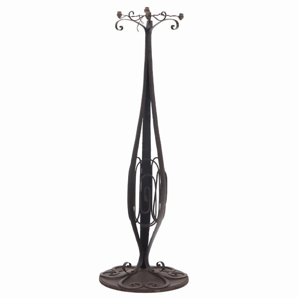 A French Art Deco hand hammered iron floor lamp C 1930
