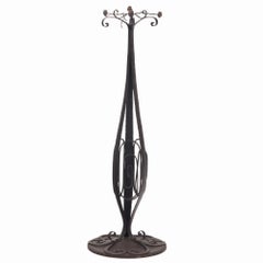 A French Art Deco hand hammered iron floor lamp C 1930
