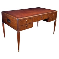 A French Art Deco Mahogany 5-Drawer Writing Desk with Leather Top