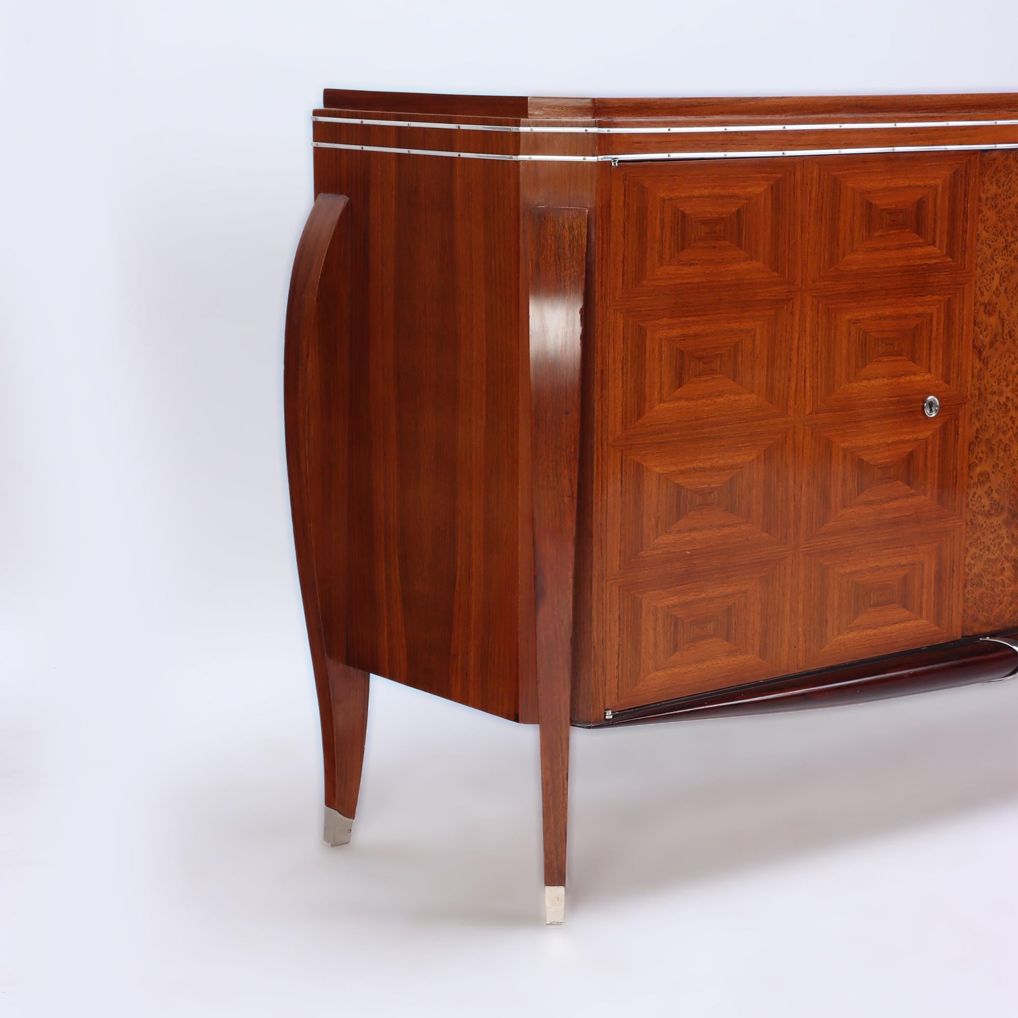 A French Art Deco rosewood and burl walnut two door server with chrome mounts circa 1935.