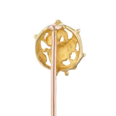 A French Art Nouveau gold and pearl stick pin
