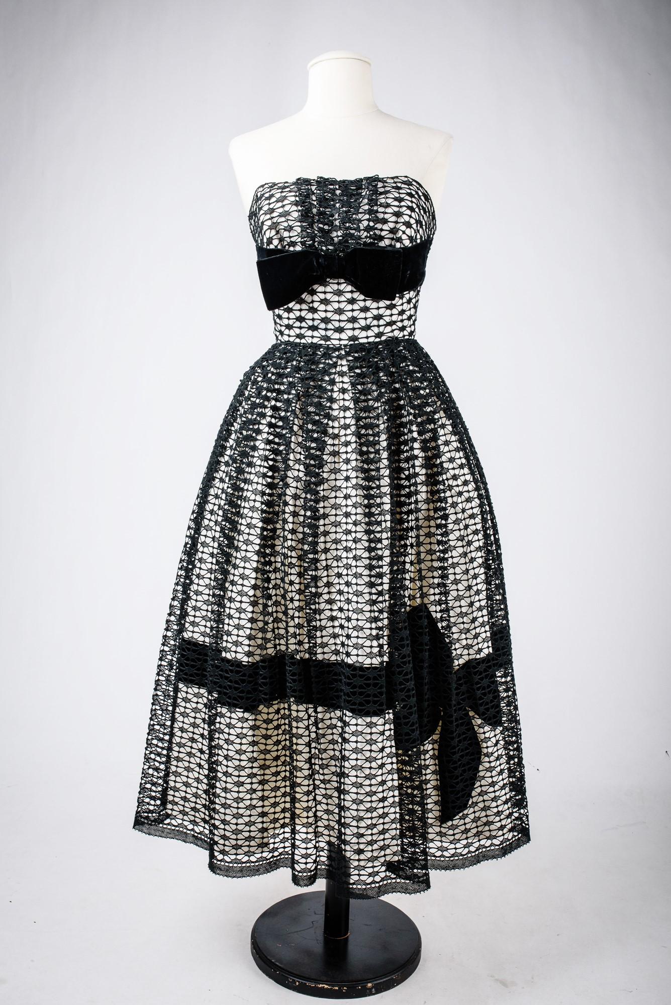 A French Ball gown in white silk faille and black lace Circa 1950 1