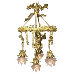 A French Belle Époque Gilt-Bronze Figural Four-Light Cherub or Cupid Chandelier