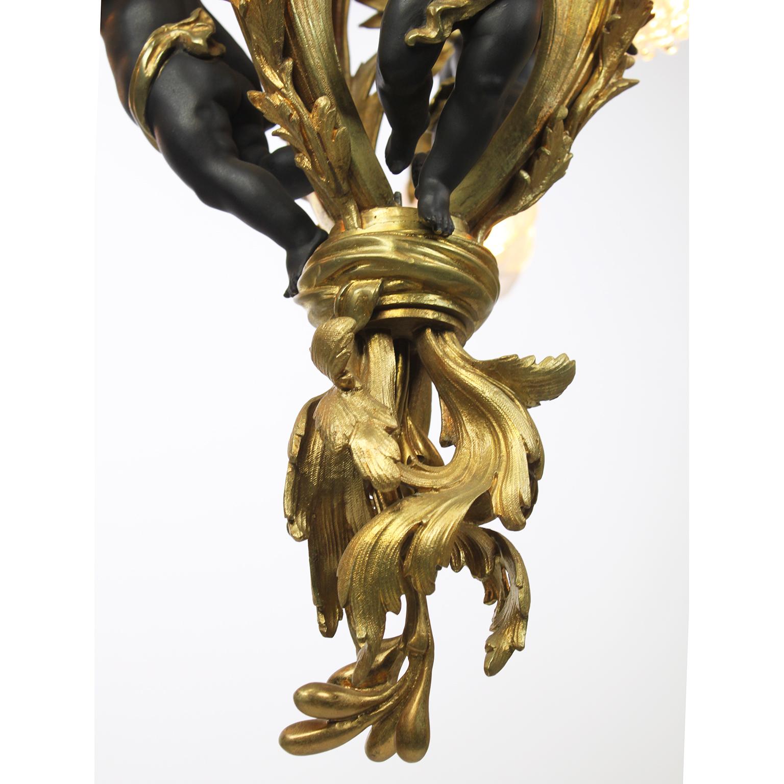 A French Belle Époque Gilt Bronze & Patinated Bronze Ten-Light Cherub Chandelier For Sale 5