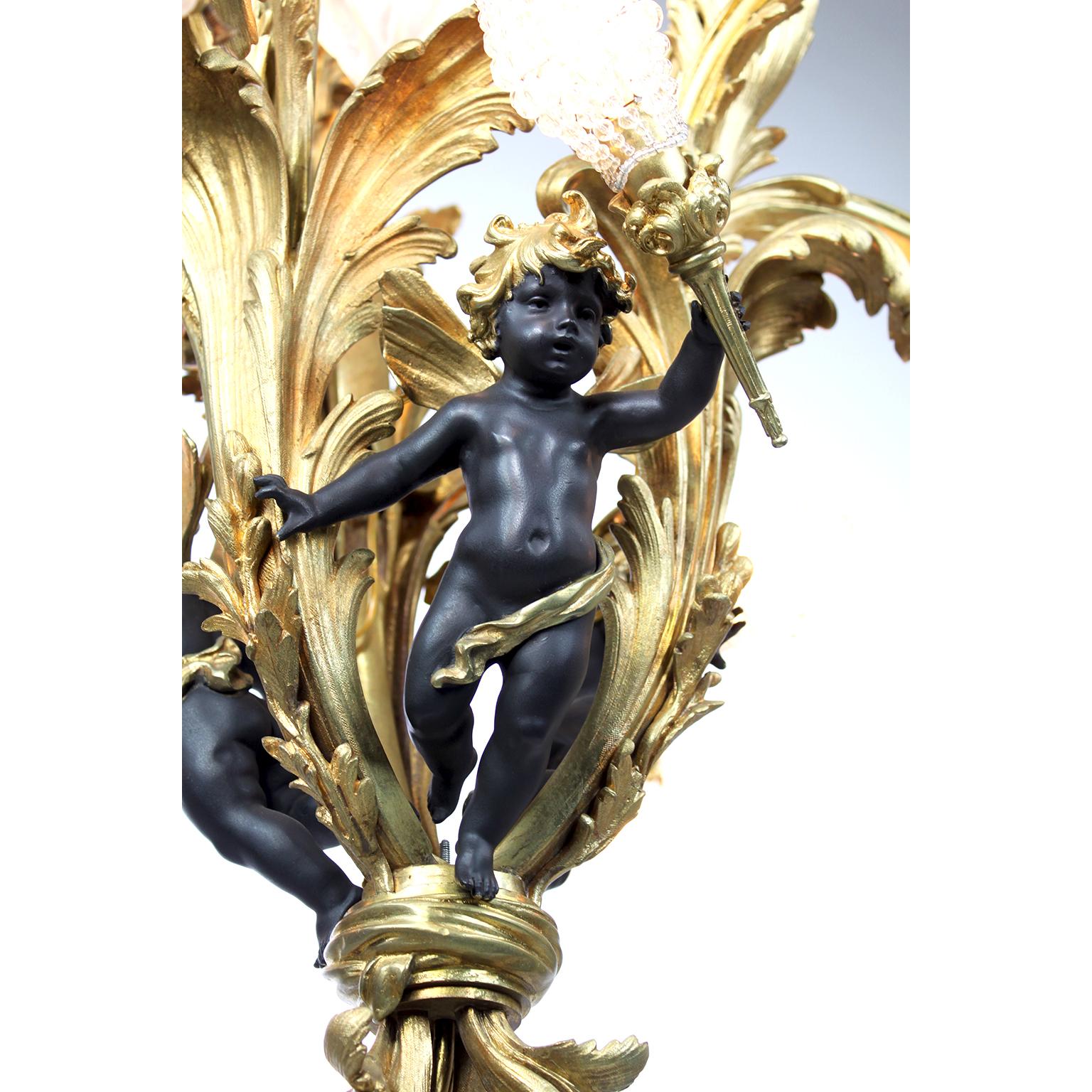 A French Belle Époque Gilt Bronze & Patinated Bronze Ten-Light Cherub Chandelier In Good Condition For Sale In Los Angeles, CA