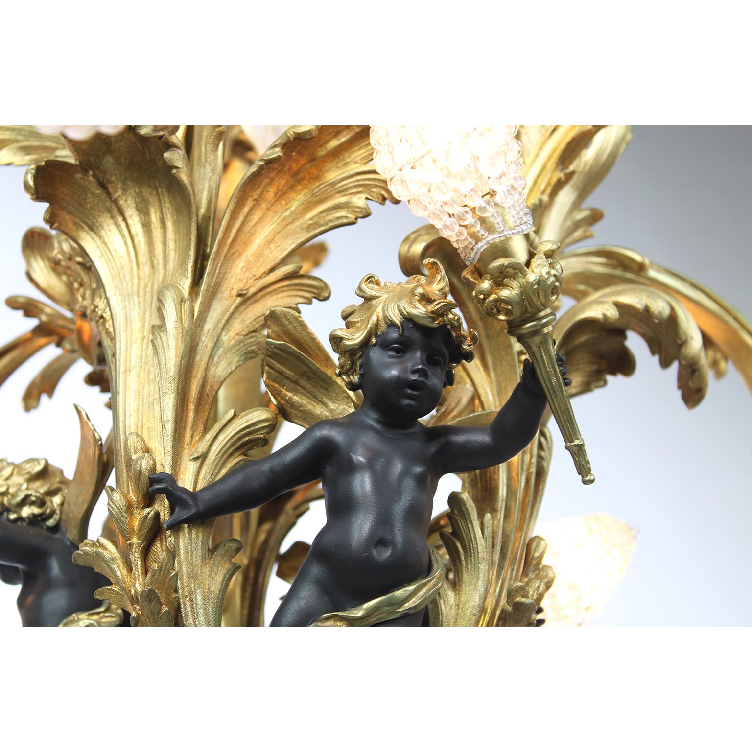 Early 20th Century A French Belle Époque Gilt Bronze & Patinated Bronze Ten-Light Cherub Chandelier For Sale