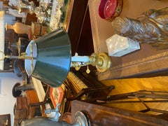 A French Belle Epoque Louis XVI Style two candle Bouillette lamp, tole shade.