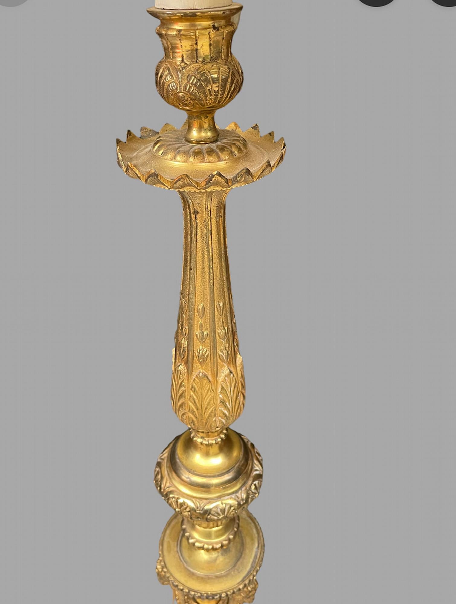 A French Brass 19th Century Standing lamp with shade with ram heads decoration and further decoration throughout brass. A beautiful standard Lamp.