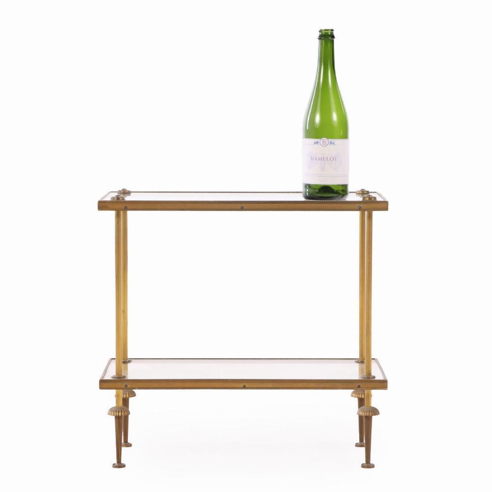 A French brass and glass tiered table, in the manner of Bagues, C. 1950. In Good Condition For Sale In Philadelphia, PA