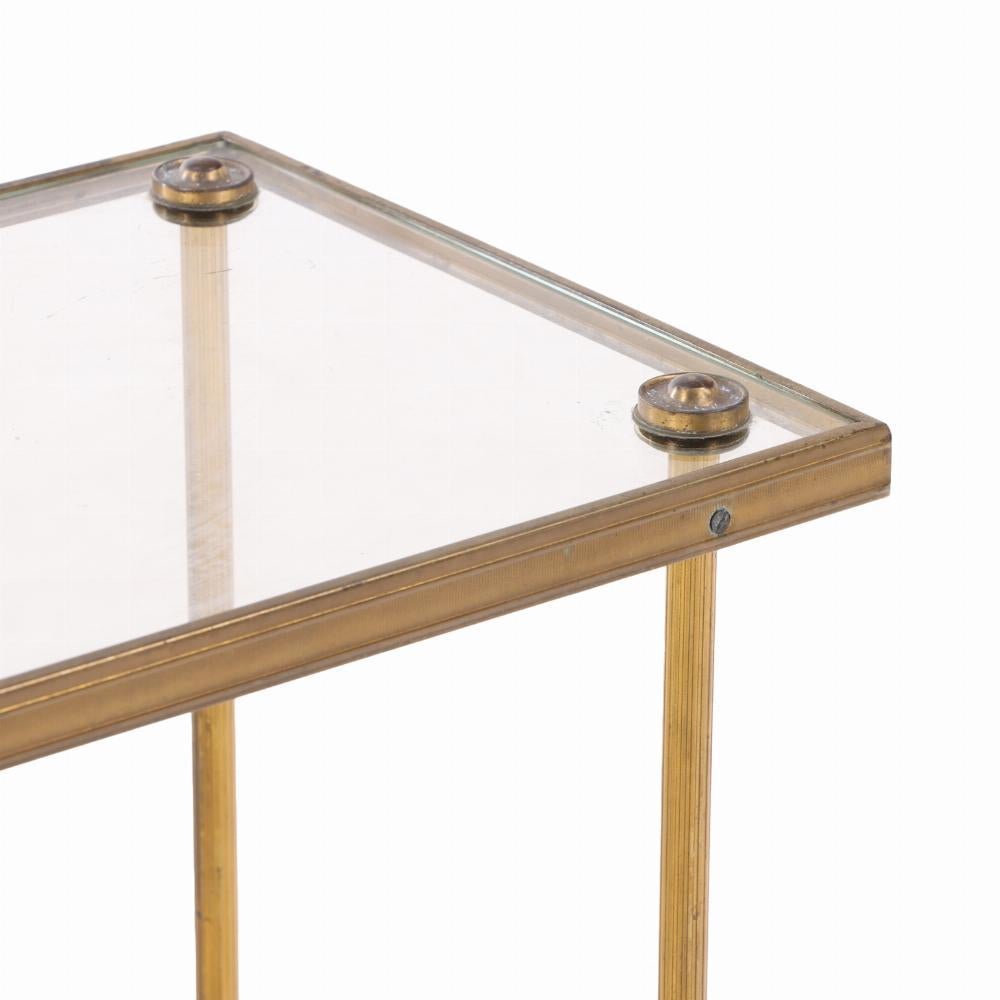 20th Century A French brass and glass tiered table, in the manner of Bagues, C. 1950. For Sale