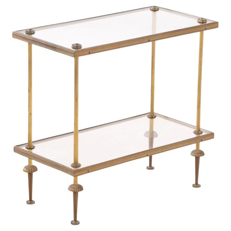 A French brass and glass tiered table, in the manner of Bagues, C. 1950. For Sale
