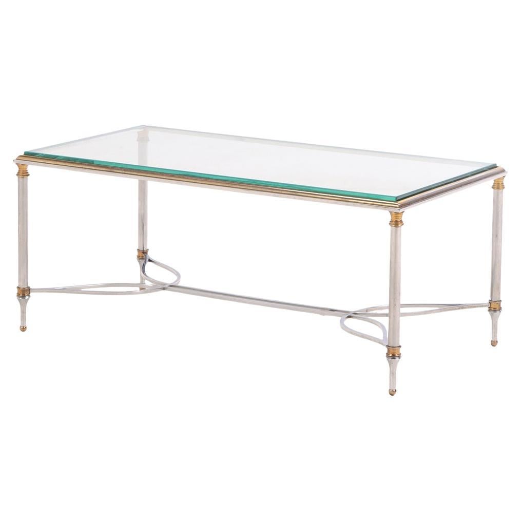 A French Brass and Steel Coffee Table in the manner of Maison Jansen, C. 1960.