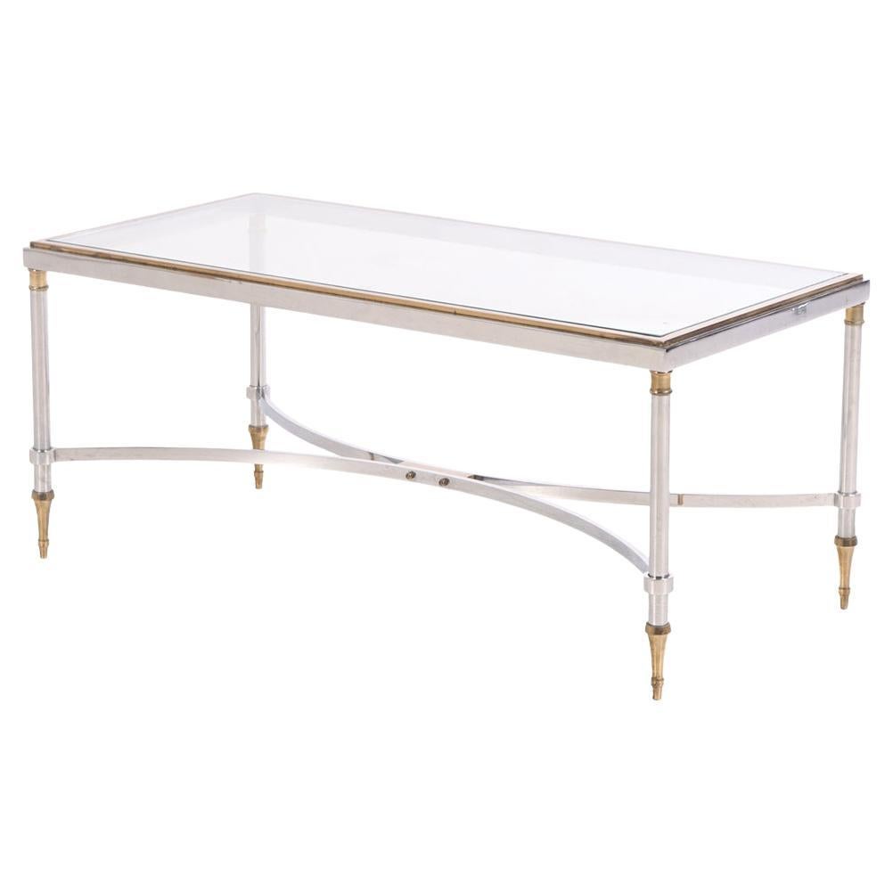 A French Brass and Steel Coffee Table in the manner of Maison Jansen, C. 1960.