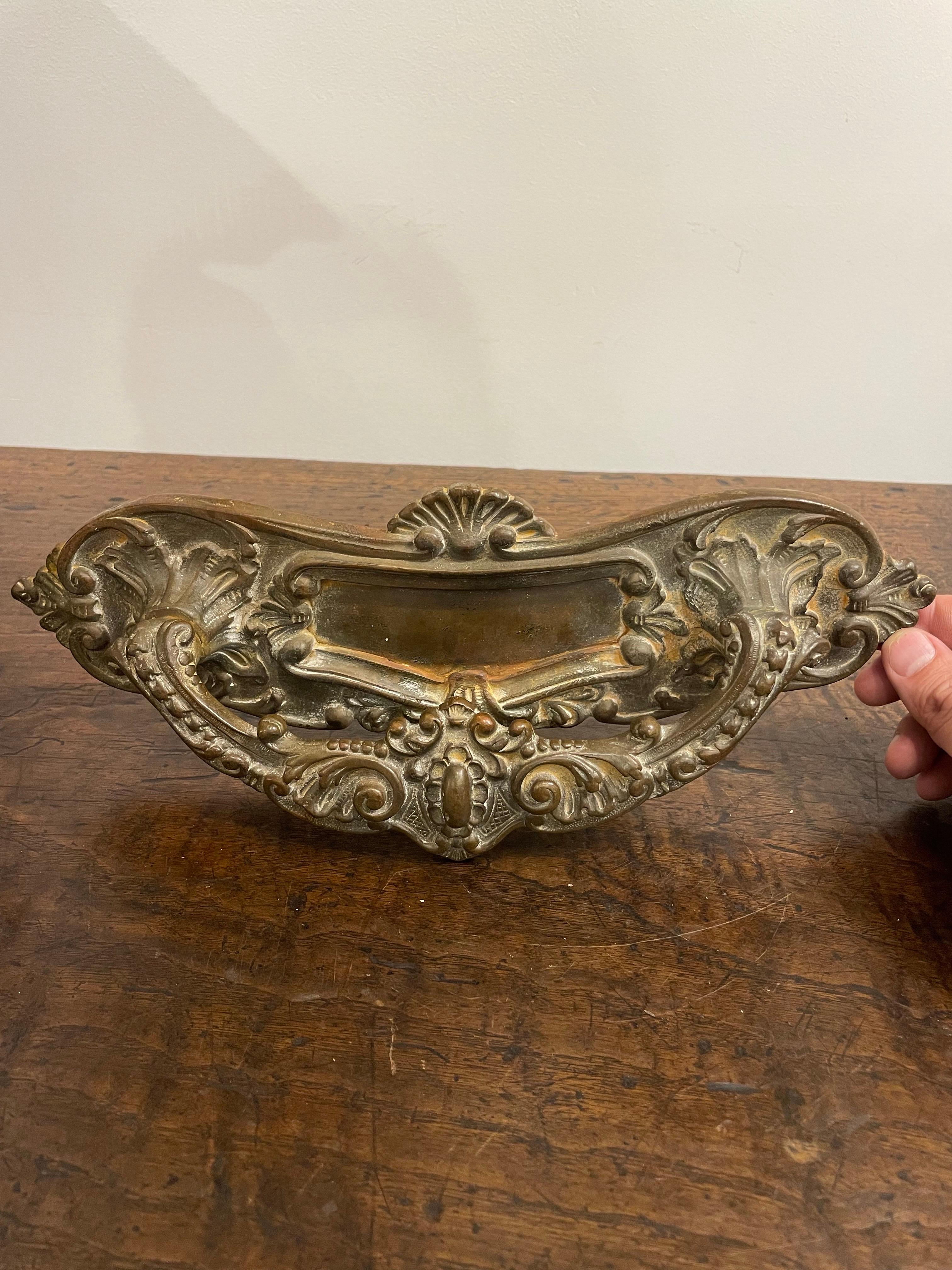 A French Bronze Door Handle, 19th Centry

Provenance: Private Australian Collection.

Dimension:
Width: 32cm
Depth: 7cm
Height: 11.3cm