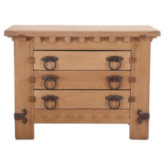 A French Brutalist heavy oak commode, C 1940.