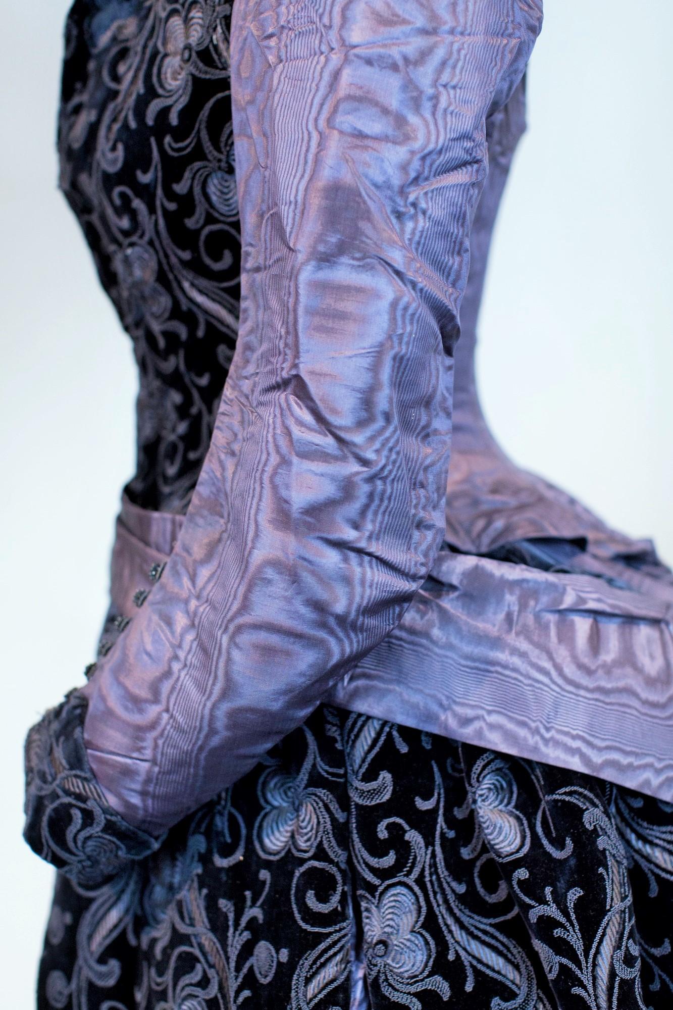 Purple A French bustle cage day Dress in silk moire and purple chiseled velvet C. 1885