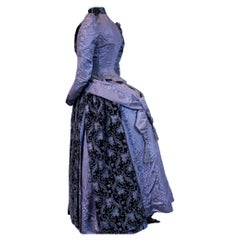 Antique A French bustle cage day Dress in silk moire and purple chiseled velvet C. 1885