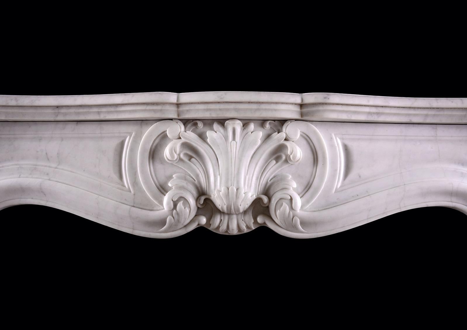 A French Carrara Marble Fireplace in the Louis XV Style In Good Condition For Sale In London, GB
