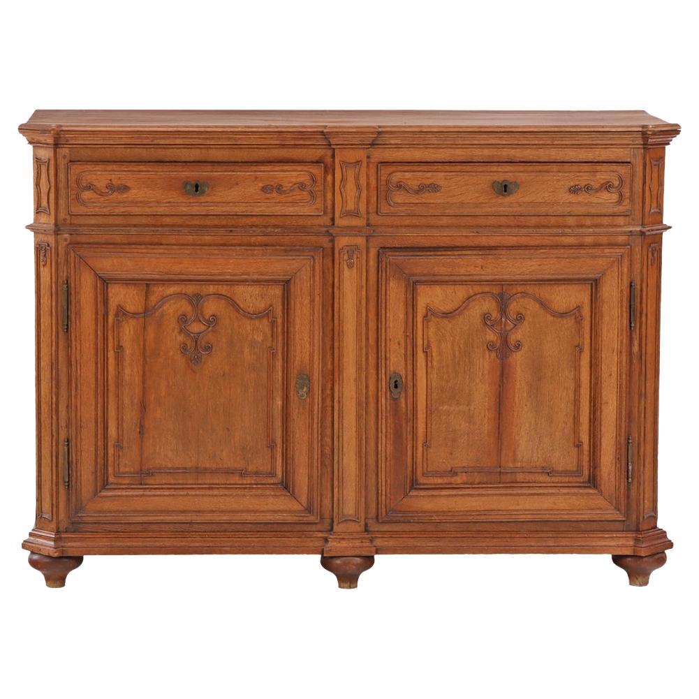 A French Carved Oak Buffet, 18th C. For Sale