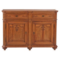 A French Carved Oak Buffet, 18th C.