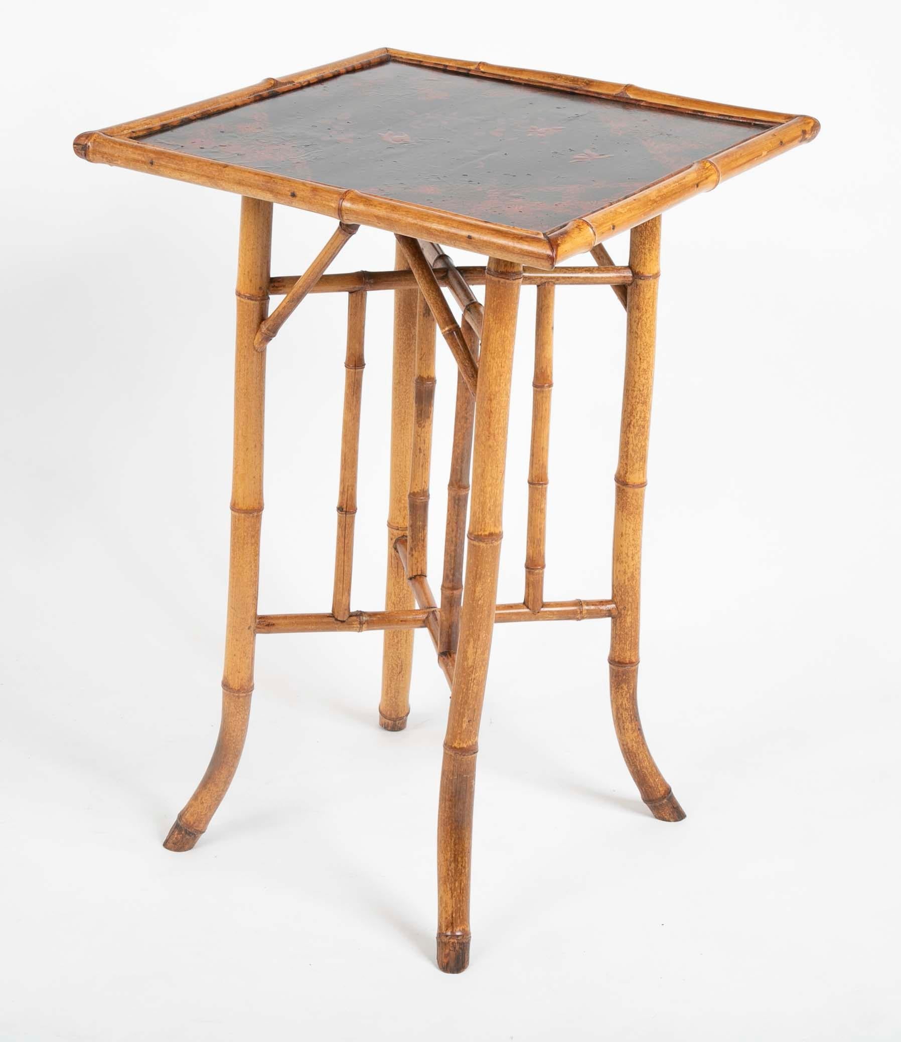 A bamboo and lacquer chinoiserie table made in France.