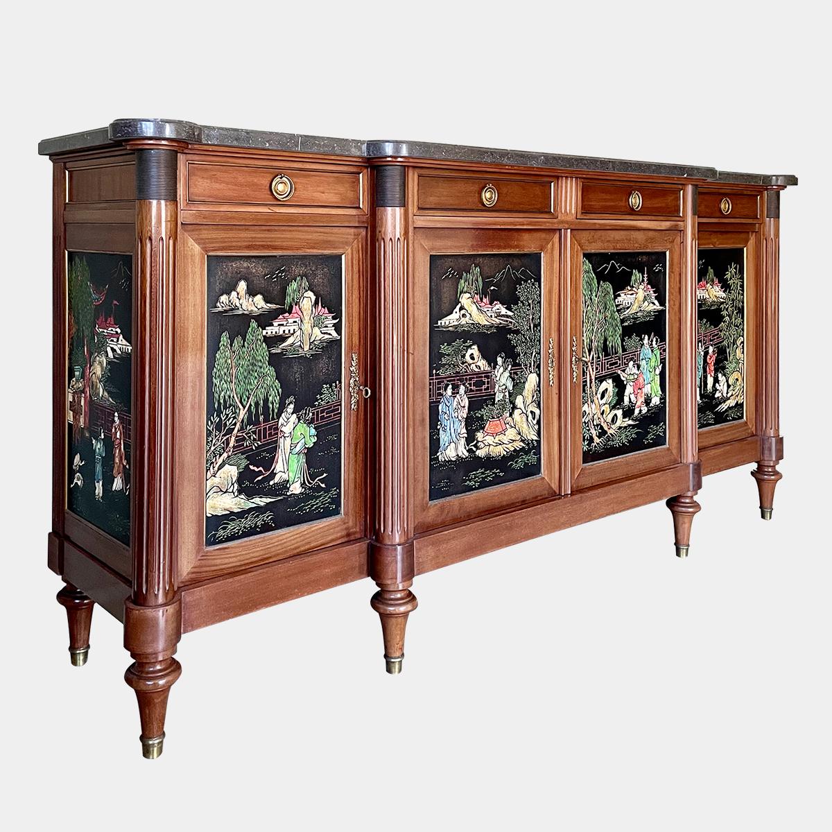 A large Chinoiserie style French sideboard/Enfilade in walnut with a Belgian fossil marble top and painted Chinoiserie panels. All original brass handles, sabot feet, locks and keys. Early to mid 20th century in the Louis XVI manner.