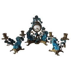 A french chinoiserie style three pieces gilt bronze and porcelain